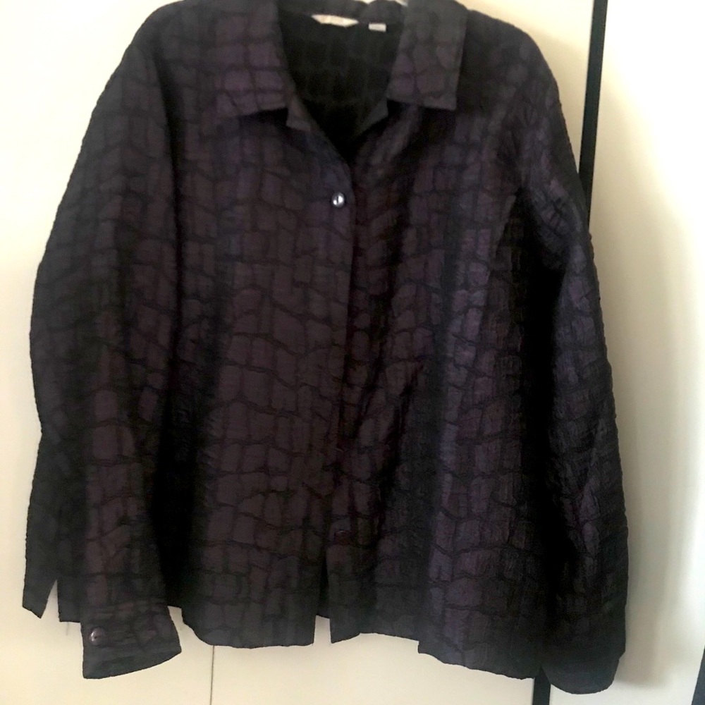 Call and black button down jacket